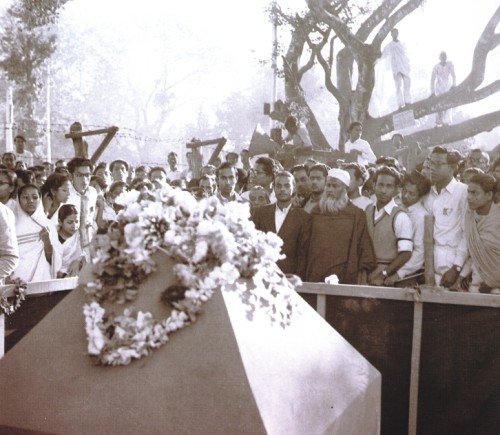 Abul Barkat's family standing in front of Shaheed Minar foundation stone in Dhaka, 21 February 1956