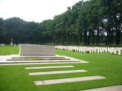 War Cemetery in Oosterbeek Netherlands with rows of white gravestones and green grass