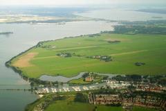Muiden cityscape with Muiden Castle and the Flevopolder in North Holland