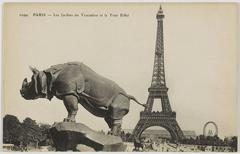 The bronze rhinoceros sculpture by Henri-Alfred Jacquemart in the Trocadéro gardens with the Eiffel Tower in the background, Paris, early 20th century