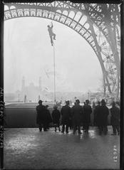 Vintage photograph of a device called 'Ouistiti' used for ascending and descending smooth cords on the Eiffel Tower in Paris, France, circa January 2, 1921