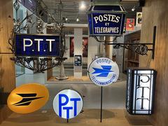 Museum exhibit sign of La Poste advertising