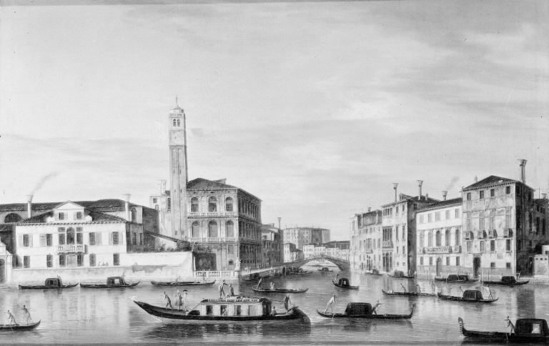 Venetian canal with gondolas and colorful buildings on either side