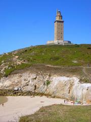 Torre de Hércules lighthouse in A Coruña, Spain at sunset