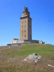 Torre de Hércules lighthouse in A Coruña, Spain at sunset