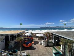 Restaurant terraces on the beach in Cannes during April 2023
