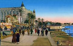 Colorized photograph of the Cannes Croisette in the 1930s showing historic buildings and vintage cars