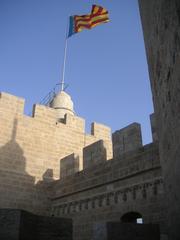 Top view of Serranos Towers with the Real Señera Valencian flag waving