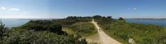 Panoramic view of Pointe des Espagnols with blue sea under cloudy sky
