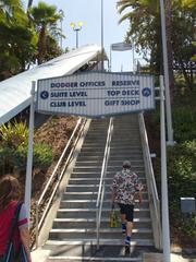 Dodger Stadium stairs leading to the upper deck with a clear blue sky