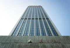 Intraco II building in Warsaw, Poland under a clear blue sky