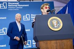 President Joe Biden listening to Elton John at Stonewall National Monument Visitor Center opening