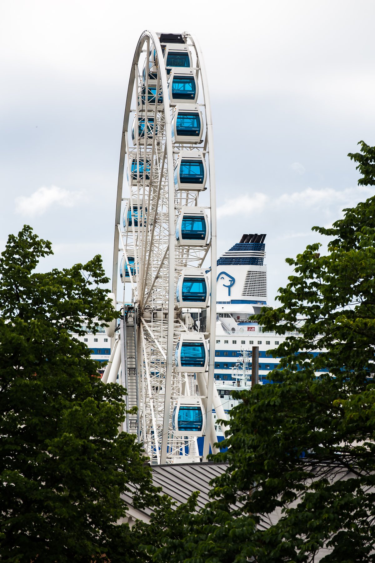 Finnair Skywheel illuminated at night in Helsinki, Finland
