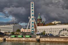 Uspenski Cathedral and Ferris wheel in Helsinki at sunset