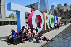 3D TORONTO sign illuminated at night in Nathan Phillips Square