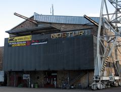 Nosturi event venue in Helsinki with red brick building and cranes by the waterfront