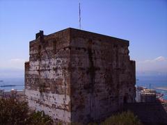 Moorish Castle in Gibraltar with stone walls and towers under a clear blue sky