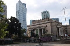 Cityscape of Warsaw in July 2023 with a sunset sky and urban buildings