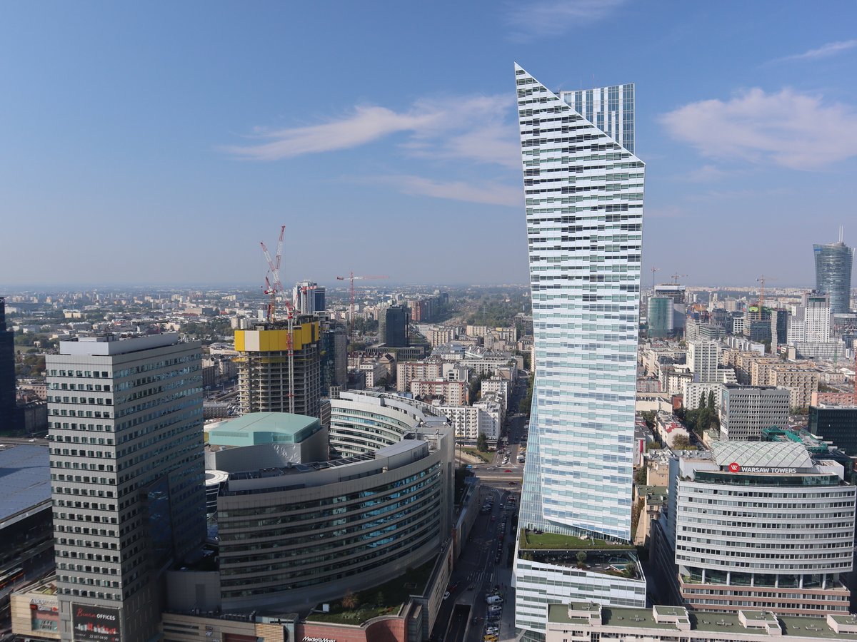 Panoramic view of Warsaw city from the observation deck of Palace of Culture and Science showing Zlote Tarasy, Varso Tower under construction, and Zlota 44 skyscraper