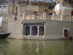 Hanuman temple submerged in water during flood season at Lalita Ghat