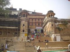 View of Lalita Ghat from a boat on the Ganges river in Varanasi