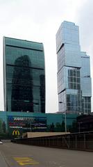 Panoramic view of Moscow International Business Center skyline with modern skyscrapers under clear blue sky