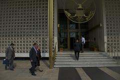 Deputy Secretary of Defense Ashton B. Carter and U.S. Ambassador Nancy J. Powell entering U.S. Embassy in New Delhi in July 2012