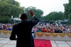 President Barack Obama waving in the courtyard of the U.S. Ambassador's residence in New Delhi, India on November 7, 2010