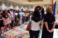 U.S. Secretary of State John Kerry addressing Embassy New Delhi staff with U.S. Charge d'Affaires Kathleen Stephens and Assistant Secretary Nisha Disei Biswal watching