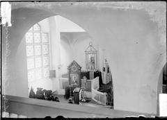 Man kneeling in Holy Trinity Church Chicago