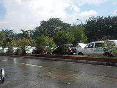 Liwasang Bonifacio gateway to Jones Bridge and Gates of Intramuros in Manila with historic plaza and river ferry station