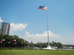 Rizal Park landmarks including Jose Rizal National Monument, Independence Flagpole and historical markers in Manila Philippines