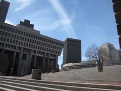 Government Center in Boston, Massachusetts, with modern architectural buildings and pedestrian plaza under cloudy sky