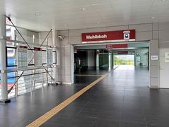 SP20 Muhibbah LRT Entrance B in Kuala Lumpur with train tracks and platform
