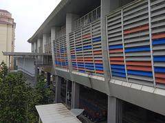 Exterior view of Muhibbah LRT Station in Kuala Lumpur with platforms and tracks