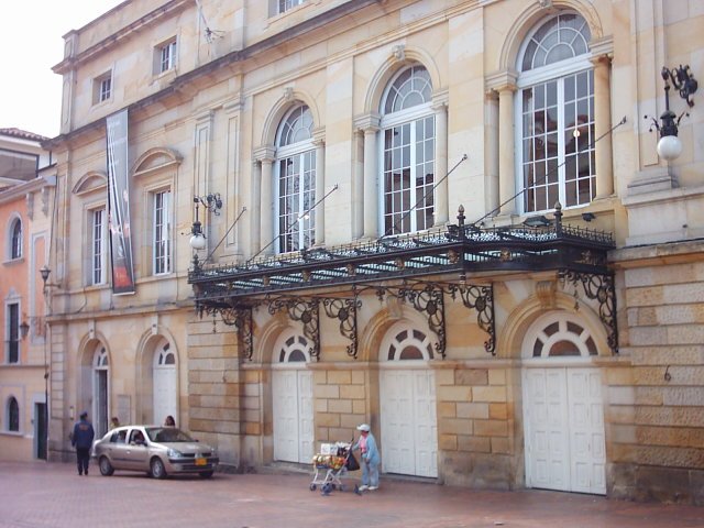 Exterior view of Teatro de Cristóbal Colón in Bogotá, Colombia at dusk with lights illuminating the building