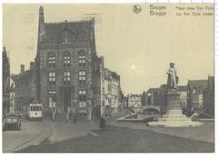 Scenic view of Place Jan Van Eyck in Bruges with historic buildings and cobblestone street