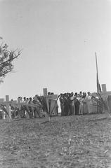 Men's choir singing during a tribute event at the Antjol war cemetery in Batavia, Indonesia on September 14, 1946