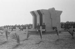 Wooden crosses decorated with palm branches at a World War II memorial cemetery in Batavia, Indonesia, dated 1946