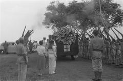 Military honor guard for fallen soldiers at Antjol cemetery in Batavia