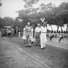 Burial ceremony of 24 family members executed by Japanese forces in Ancol, Batavia, February 8, 1948, black and white historical photo