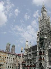 Marianplatz square in Munich with historical buildings and fountain