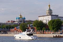 Boats and ships on the Moskva River in Moscow with the Krutitskaya Embankment