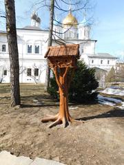 Novospassky Monastery in spring with clear blue sky and surrounding greenery