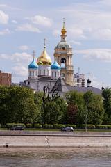 View of Novospassky Monastery in Moscow with golden domes and surrounding greenery
