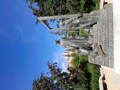 Gardens of the Triumph in Granada, Spain with vibrant greenery and colorful flowers