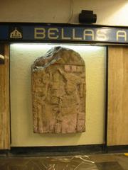 Replica of a Mayan stele depicting a richly attired priest at Metro Bellas Artes, Mexico City