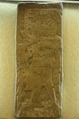 Replica of the Huilocintla bas relief depicting an animal licking blood from the mouth of a self-sacrificing priest