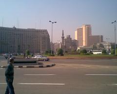 Aerial view of Tahrir Square in Cairo, Egypt bustling with traffic and surrounded by buildings