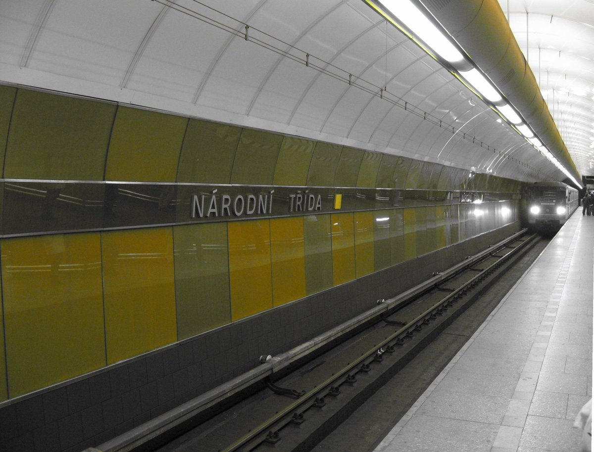 Metro station Národní třída in Prague with train arriving on platform